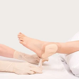 Step 3 of Mepilex Border Heel reapplication